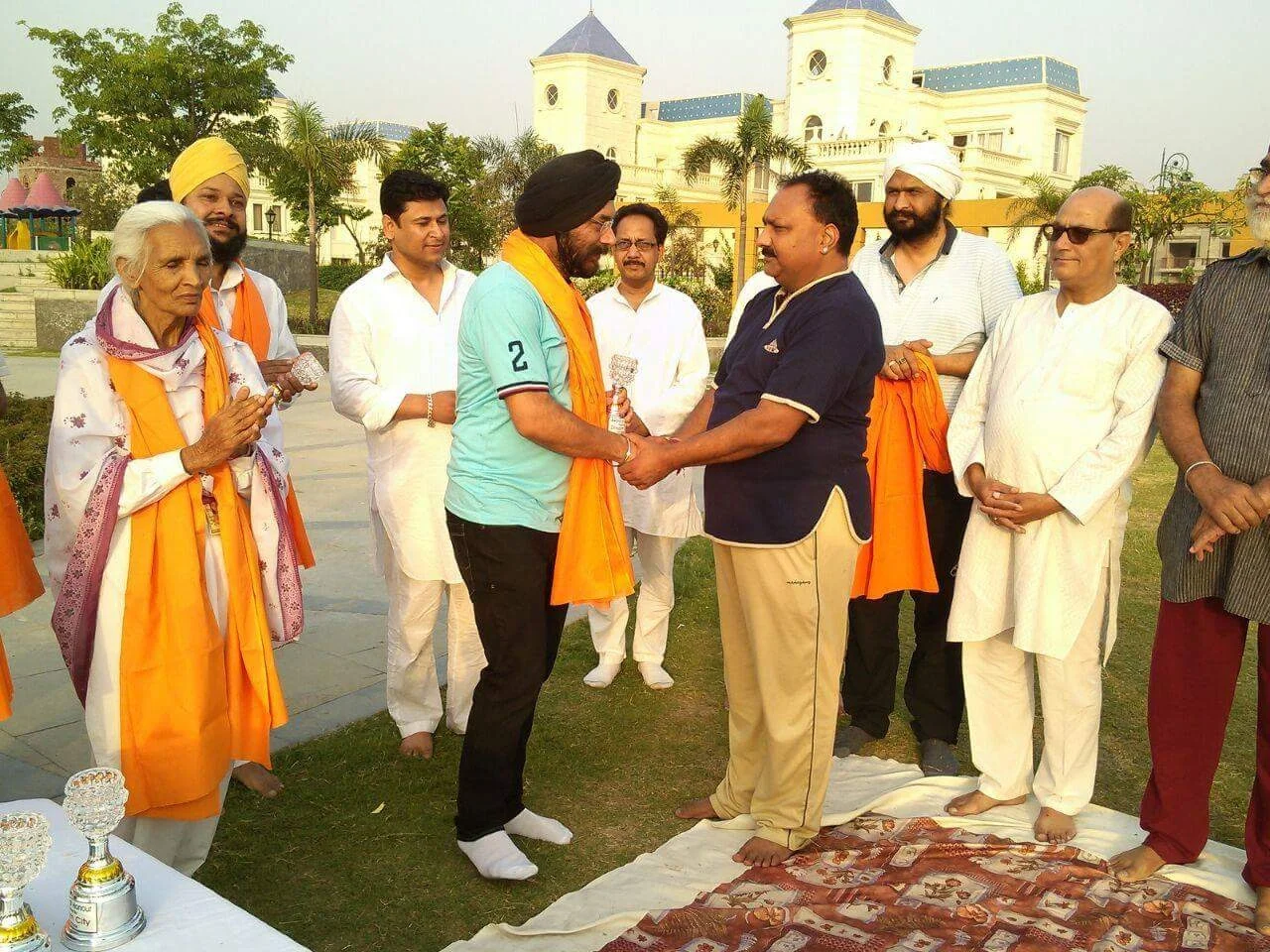 Dr. Bhupinder Arora meeting with political figures at an event