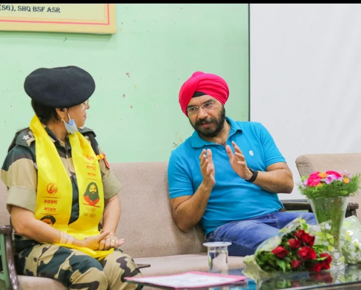 Dr. Bhupinder Arora sharing Ayurvedic knowledge with a female officer of SHQ BSF Amritsar