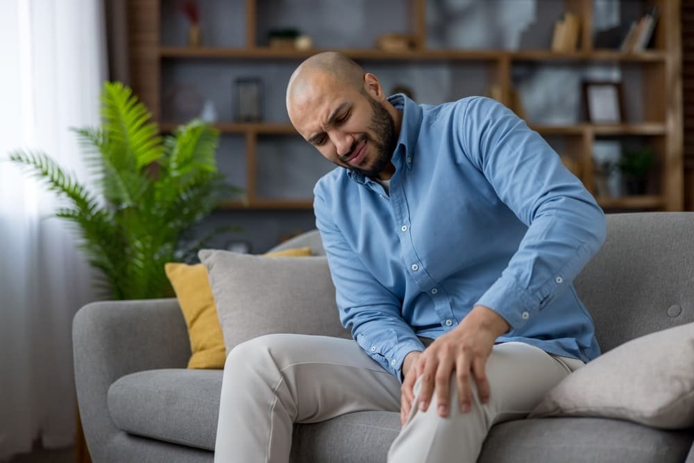 Man Suffering From Knee Pain